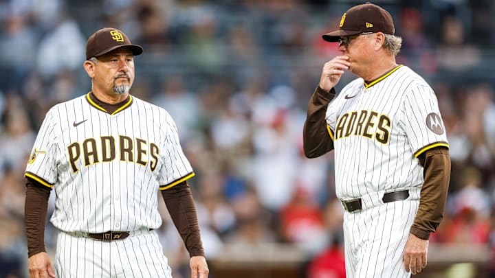 Jun 24, 2025; San Diego, California, USA; San Diego Padres manager Mike Shildt (8) talks to San Diego Padres Pitching Coach Ruben Niebla (57) after the injury to San Diego Padres starting pitcher Ryan Bergert (38) during the fourth inning against the Washington Nationals at Petco Park. Mandatory Credit: David Frerker-Imagn Images Jun 24, 2025; San Diego, California, USA; San Diego Padres manager Mike Shildt (8) talks to San Diego Padres Pitching Coach Ruben Niebla (57) after the injury to San Diego Padres starting pitcher Ryan Bergert (38) during the fourth inning against the Washington Nationals at Petco Park. Mandatory Credit: David Frerker-Imagn Images
