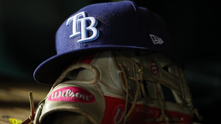 Apr 3, 2023; Washington, District of Columbia, USA; A general view of a Tampa Bay Rays hat and glove during the seventh inning of the game against the Washington Nationals at Nationals Park. Apr 3, 2023; Washington, District of Columbia, USA; A general view of a Tampa Bay Rays hat and glove during the seventh inning of the game against the Washington Nationals at Nationals Park.