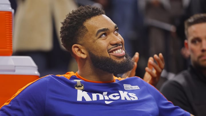 Dec 19, 2024: New York Knicks forward Karl-Anthony Towns watches a tribute to him played by his former team, the Minnesota Timberwolves.