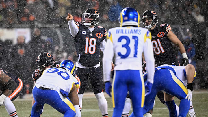Jan 18, 2026; Chicago, IL, USA; Chicago Bears quarterback Caleb Williams (18) calls the snap count at the line of scrimmage against the Los Angeles Rams during the first quarter of an NFC Divisional Round game at Soldier Field. Mandatory Credit: Matt Marton-Imagn Images
