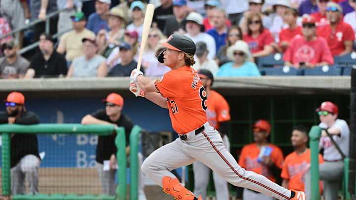 Baltimore Orioles v Philadelphia Phillies: Orioles infielder Jackson Holliday follows through after hitting a ball during a spring training game against the Philadelphia Phillies