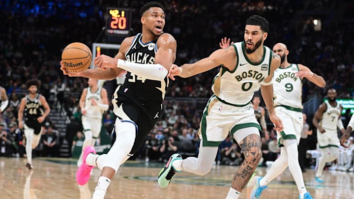 Jan 11, 2024; Milwaukee, Wisconsin, USA; Milwaukee Bucks forward Giannis Antetokounmpo (34) drives for the basket against Boston Celtics forward Jayson Tatum (0) in the second quarter at Fiserv Forum. Mandatory Credit: Benny Sieu-Imagn Images Jan 11, 2024; Milwaukee, Wisconsin, USA; Milwaukee Bucks forward Giannis Antetokounmpo (34) drives for the basket against Boston Celtics forward Jayson Tatum (0) in the second quarter at Fiserv Forum. Mandatory Credit: Benny Sieu-Imagn Images