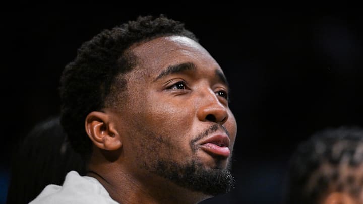 Cleveland Cavaliers star Donovan Mitchell looks on during the game between the New York Liberty and the Connecticut Sun Cleveland Cavaliers star Donovan Mitchell looks on during the game between the New York Liberty and the Connecticut Sun