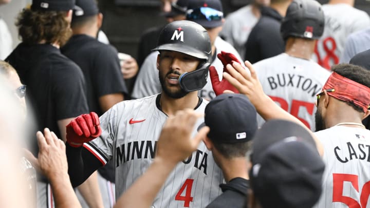 Jul 10, 2024; Chicago, Illinois, USA; Minnesota Twins shortstop Carlos Correa (4) celebrates in the dugout after hitting a home run against the Chicago White Sox during the sixth inning at Guaranteed Rate Field. Mandatory Credit: Matt Marton-USA TODAY Sports Jul 10, 2024; Chicago, Illinois, USA; Minnesota Twins shortstop Carlos Correa (4) celebrates in the dugout after hitting a home run against the Chicago White Sox during the sixth inning at Guaranteed Rate Field. Mandatory Credit: Matt Marton-USA TODAY Sports