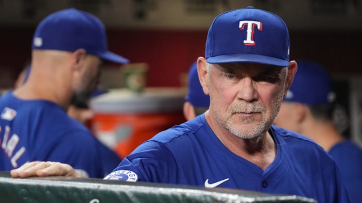 Sep 10, 2024; Phoenix, Arizona, USA; Texas Rangers manager Bruce Bochy (15) watches game action against the Arizona Diamondbacks in the first inning at Chase Field. 