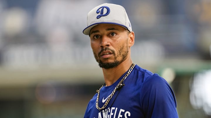 Jul 8, 2025; Milwaukee, Wisconsin, USA;  Los Angeles Dodgers infielder Mookie Betts looks around during batting practice prior to the game against the Los Angeles Dodgers at American Family Field. Mandatory Credit: Jeff Hanisch-Imagn Images