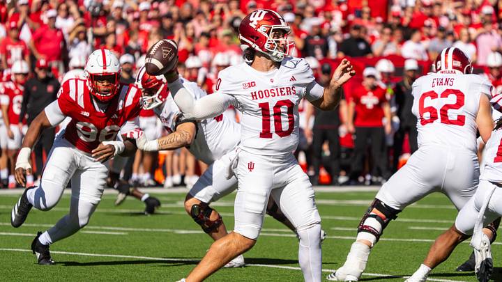 Oct 10, 2026; Lincoln, Nebraska, USA;  Indiana Hoosiers quarterback Josh Hoover (10) passes against the Nebraska Cornhuskers during the first quarter at Memorial Stadium.  Mandatory Credit: Dylan Widger-Imagn Images