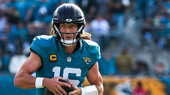Jacksonville Jaguars quarterback Trevor Lawrence (16) scrambles during the second quarter in an NFL football AFC Wild Card playoff matchup, Sunday, Jan. 11, 2026, in Jacksonville, Fla. Bills lead 10-7 at the half over the Jaguars. [Doug Engle/Florida Times-Union]