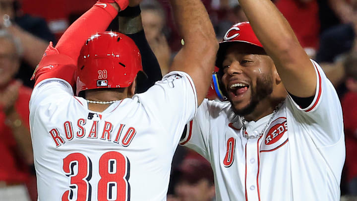 Cincinnati Reds players Amed Rosario, Dominic Smith