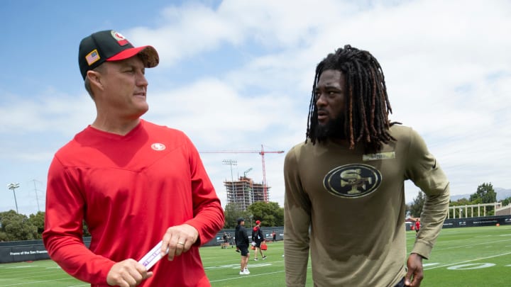 San Francisco 49ers general manager John Lynch (L) and wide receiver Brandon Aiyuk (R)