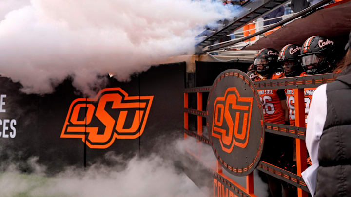 Oklahoma State waits to run on to the field before the college football game between the Oklahoma State Cowboys and the Iowa State Cyclones at Boone Pickens Stadium in Stillwater, Okla., Saturday Nov. 29, 2025.