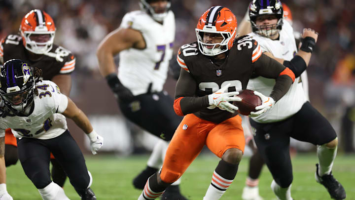 Nov 16, 2025; Cleveland, Ohio, USA;  Cleveland Browns linebacker Devin Bush (30) intercepts a pass and returns it for a touchdown during the second quarter against the Baltimore Ravens at Huntington Bank Field. Mandatory Credit: Scott Galvin-Imagn Images
