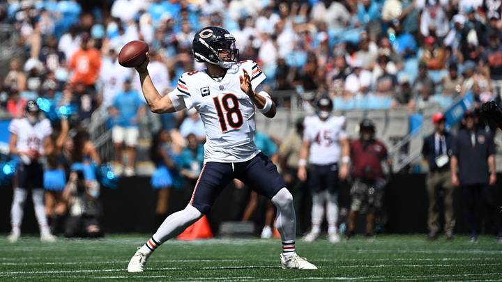 Chicago Bears quarterback Caleb Williams (18) throws a touchdown pass to tight end Cole Kmet (85) in the second quarter against the Carolina Panthers at Bank of America Stadium. Mandatory Credit: Bob Donnan-Imagn Images Chicago Bears quarterback Caleb Williams (18) throws a touchdown pass to tight end Cole Kmet (85) in the second quarter against the Carolina Panthers at Bank of America Stadium. Mandatory Credit: Bob Donnan-Imagn Images
