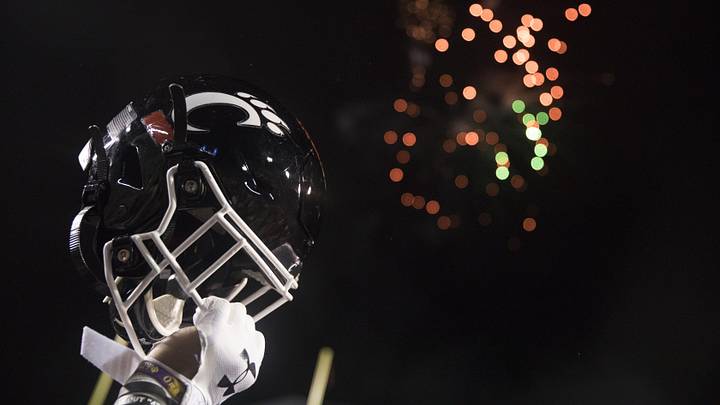 Cincinnati Bearcats player lifts his helmet after the Birmingham Bowl between Cincinnati Bearcats and Boston College Eagles on Thursday, Jan. 2, 2020, at Legion Field in Birmingham, Ala. Cincinnati Bearcats wont 38-6.
Birmingham Bowl Cincinnati Bearcats player lifts his helmet after the Birmingham Bowl between Cincinnati Bearcats and Boston College Eagles on Thursday, Jan. 2, 2020, at Legion Field in Birmingham, Ala. Cincinnati Bearcats wont 38-6.
Birmingham Bowl