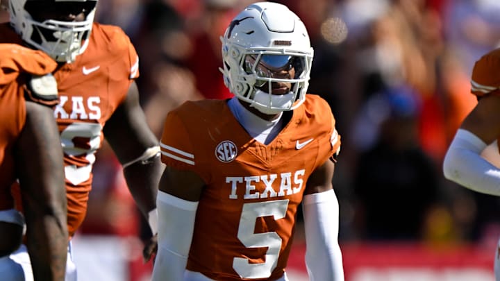 Texas Longhorns defensive back Malik Muhammad (5) celebrates after an interception during the game between the Texas Longhorns and the Oklahoma Sooners at the Cotton Bowl.
