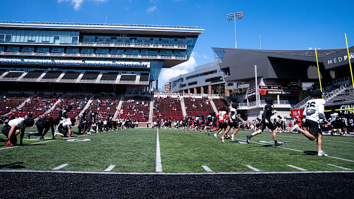 Cincinnati Bearcats teams runs during the Cincinnati Bearcats football spring practice at Nippert Stadium on Saturday, April 12, 2025.