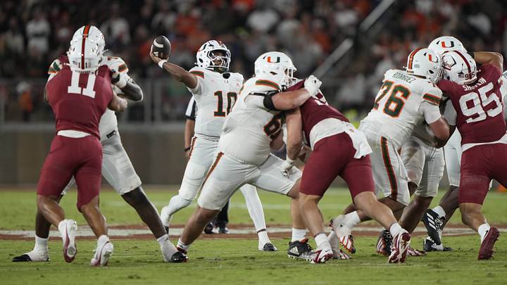 Sep 4, 2026; Stanford, California, USA; Miami Hurricanes quarterback Darian Mensah (10) throws downfield against the Stanford Cardinal during the third quarter at Stanford Stadium. Mandatory Credit: Stan Szeto-Imagn Images Sep 4, 2026; Stanford, California, USA; Miami Hurricanes quarterback Darian Mensah (10) throws downfield against the Stanford Cardinal during the third quarter at Stanford Stadium. Mandatory Credit: Stan Szeto-Imagn Images