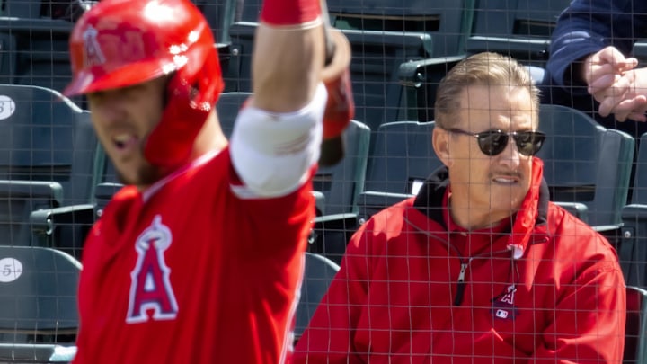 Mar 16, 2021; Tempe, Arizona, USA; Los Angeles Angels owner Arte Moreno (right) and outfielder Mike Trout against the Cleveland Indians during a Spring Training game at Tempe Diablo Stadium. Mandatory Credit: Mark J. Rebilas-Imagn Images Mar 16, 2021; Tempe, Arizona, USA; Los Angeles Angels owner Arte Moreno (right) and outfielder Mike Trout against the Cleveland Indians during a Spring Training game at Tempe Diablo Stadium. Mandatory Credit: Mark J. Rebilas-Imagn Images