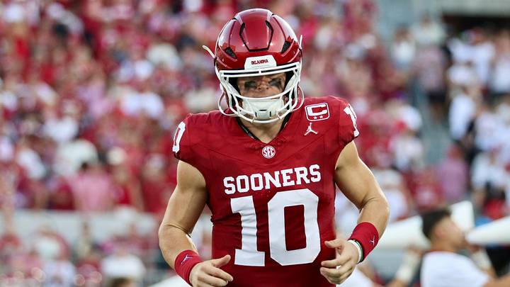 Oklahoma quarterback John Mateer runs onto the field before facing New Mexico. Oklahoma quarterback John Mateer runs onto the field before facing New Mexico.