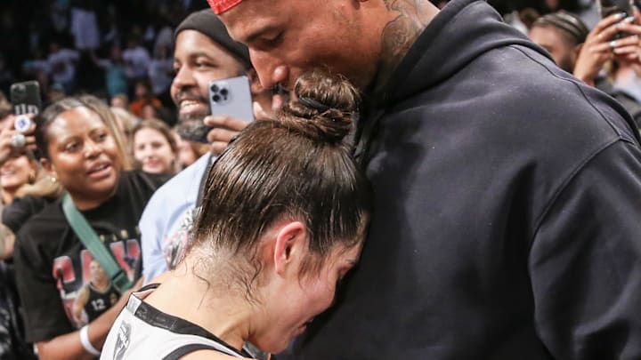Oct 18, 2023; Brooklyn, New York, USA; Las Vegas Aces guard Kelsey Plum (10) celebrates with her husband, New York Giants tight end Darren Waller, after winning the 2023 WNBA Finals at Barclays Center. Mandatory Credit: Wendell Cruz-Imagn Images Oct 18, 2023; Brooklyn, New York, USA; Las Vegas Aces guard Kelsey Plum (10) celebrates with her husband, New York Giants tight end Darren Waller, after winning the 2023 WNBA Finals at Barclays Center. Mandatory Credit: Wendell Cruz-Imagn Images