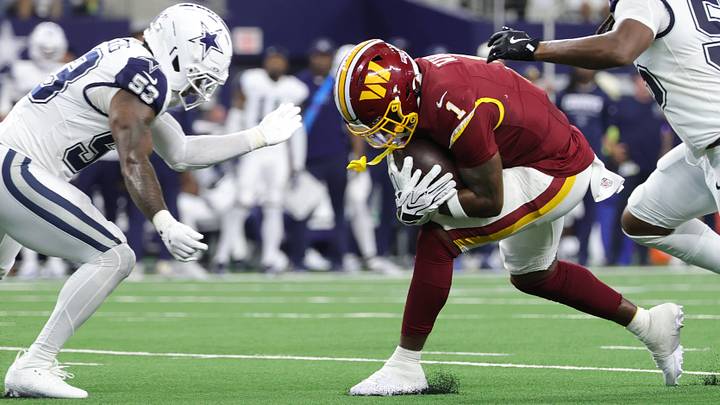 Sep 20, 2026; Arlington, Texas, USA; Washington Commanders running back Rachaad White (1) runs the ball against Dallas Cowboys linebackers Jaishawn Barham (55) and Dee Winters (53) during the first half at AT&T Stadium. Mandatory Credit: Kevin Jairaj-Imagn Images Sep 20, 2026; Arlington, Texas, USA; Washington Commanders running back Rachaad White (1) runs the ball against Dallas Cowboys linebackers Jaishawn Barham (55) and Dee Winters (53) during the first half at AT&T Stadium. Mandatory Credit: Kevin Jairaj-Imagn Images