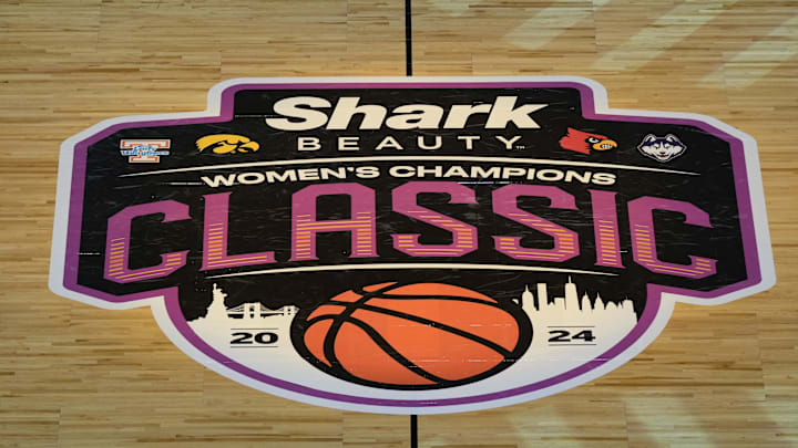 Dec 7, 2024; Brooklyn, New York, USA; A general view of the Women's Champions Classic logo before the game between the Connecticut Huskies and the Louisville Cardinals at Barclays Center. Mandatory Credit: Lucas Boland-Imagn Images Dec 7, 2024; Brooklyn, New York, USA; A general view of the Women's Champions Classic logo before the game between the Connecticut Huskies and the Louisville Cardinals at Barclays Center. Mandatory Credit: Lucas Boland-Imagn Images