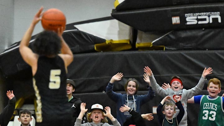 North Andover fans attempt to distract Shaundez Buckhanan of Springfield Central as he takes a foul shot during the MIAA Division 1 boys basketball Round of 16 state tournament game at North Andover High School on Tuesday, March 7, 2023. North Andover defeated Springfield Central 78-51.

11424156002p Ma Nan Boysbasketball2ds