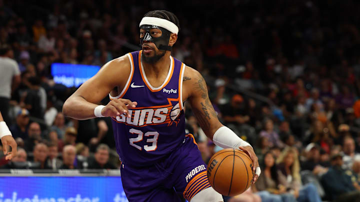 Mar 22, 2026; Phoenix, Arizona, USA; Phoenix Suns guard Jordan Goodwin (23) dribbles down court against the Toronto Raptors during the third quarter at Mortgage Matchup Center. Mandatory Credit: Anna Carrington-Imagn Images