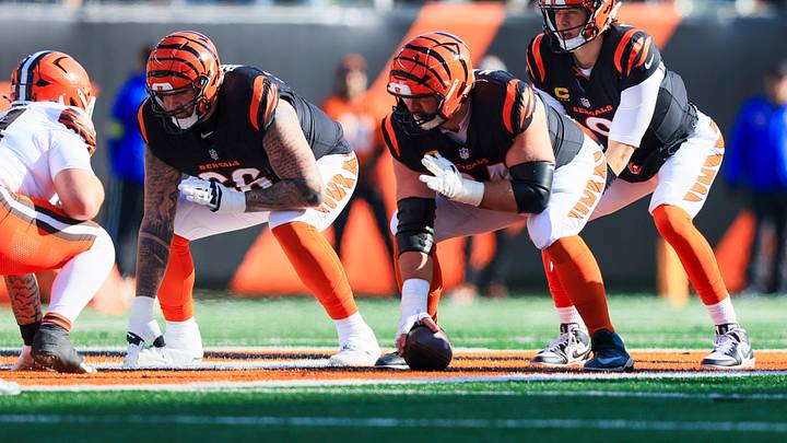Jan 4, 2026; Cincinnati, Ohio, USA; Cincinnati Bengals quarterback Joe Burrow (9) stands over center Ted Karras (64) during the first quarter against the Cleveland Browns at Paycor Stadium. Mandatory Credit: Katie Stratman-Imagn Images Jan 4, 2026; Cincinnati, Ohio, USA; Cincinnati Bengals quarterback Joe Burrow (9) stands over center Ted Karras (64) during the first quarter against the Cleveland Browns at Paycor Stadium. Mandatory Credit: Katie Stratman-Imagn Images