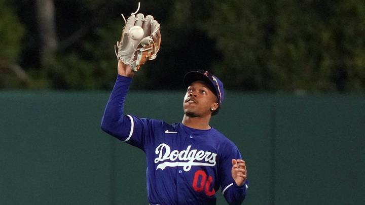Mar 25, 2025; Anaheim, California, USA; Los Angeles Dodgers outfielder George Kendall (00) catches a fly ball for the final out against the Los Angeles Angels at Angel Stadium. Mandatory Credit: Kirby Lee-Imagn Images Mar 25, 2025; Anaheim, California, USA; Los Angeles Dodgers outfielder George Kendall (00) catches a fly ball for the final out against the Los Angeles Angels at Angel Stadium. Mandatory Credit: Kirby Lee-Imagn Images