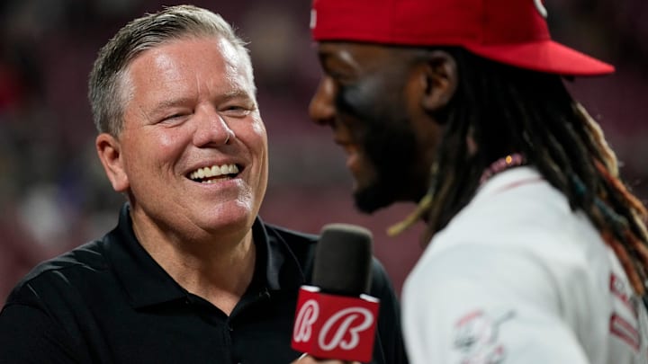 Bally Sports broadcaster Jim Day interviews Cincinnati Reds shortstop Elly De La Cruz (44) after the ninth inning of the MLB National League game between the Cincinnati Reds and the Pittsburgh Pirates at Great American Ball Park on Monday, June 24, 2024. The Reds won 11-5.