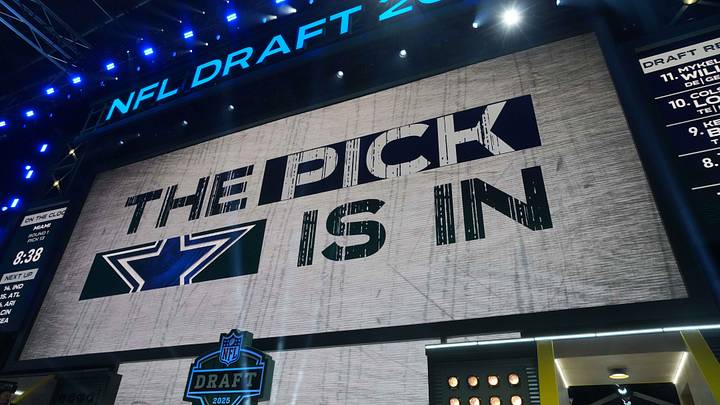 The Dallas Cowboys logo is projected on the video board during the NFL Draft at Lambeau Field. The Dallas Cowboys logo is projected on the video board during the NFL Draft at Lambeau Field.