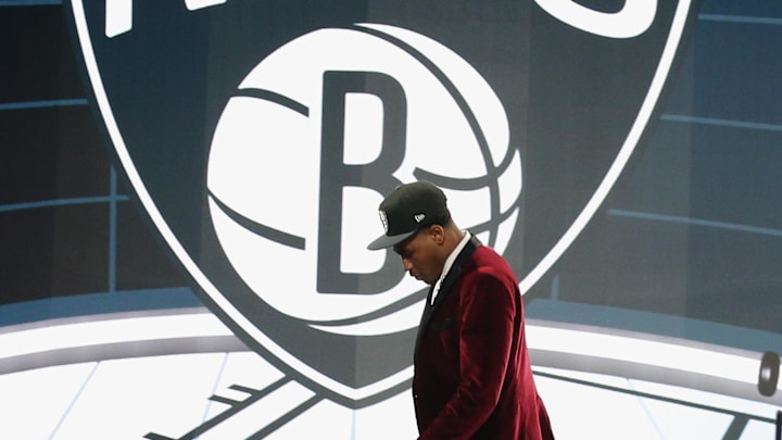 Jul 29, 2021; Brooklyn, New York, USA; Cameron Thomas (LSU) walks off the stage after being selected as the number twenty-seven overall pick by the Brooklyn Nets in the first round of the 2021 NBA Draft at Barclays Center. Mandatory Credit: Brad Penner-Imagn Images Jul 29, 2021; Brooklyn, New York, USA; Cameron Thomas (LSU) walks off the stage after being selected as the number twenty-seven overall pick by the Brooklyn Nets in the first round of the 2021 NBA Draft at Barclays Center. Mandatory Credit: Brad Penner-Imagn Images