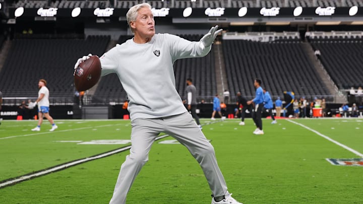 Sep 15, 2025; Paradise, Nevada, USA; Las Vegas Raiders head coach Pete Carroll throws a ball before the game against the Los Angeles Chargers at Allegiant Stadium. Mandatory Credit: Kiyoshi Mio-Imagn Images