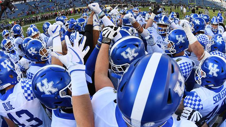 Dec 29, 2017; Nashville, TN, USA; Kentucky Wildcats players huddle before the game against the Northwestern Wildcats in the 2017 Music Bowl at Nissan Stadium. Mandatory Credit: Christopher Hanewinckel-Imagn Images Dec 29, 2017; Nashville, TN, USA; Kentucky Wildcats players huddle before the game against the Northwestern Wildcats in the 2017 Music Bowl at Nissan Stadium. Mandatory Credit: Christopher Hanewinckel-Imagn Images