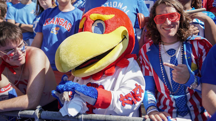 Sep 24, 2022; Lawrence, Kansas, USA; The Kansas Jayhawks mascot sits with fans against the Duke Blue Devils during the second half of the game at David Booth Kansas Memorial Stadium. 
