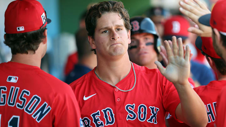 Boston Red Sox outfielder Roman Anthony (48) is congratulated after he scored a run against the Philadelphia Phillies during the third inning of a spring training game at BayCare Ballpark in Clearwater, Fla., on Feb. 28, 2025. Boston Red Sox outfielder Roman Anthony (48) is congratulated after he scored a run against the Philadelphia Phillies during the third inning of a spring training game at BayCare Ballpark in Clearwater, Fla., on Feb. 28, 2025.