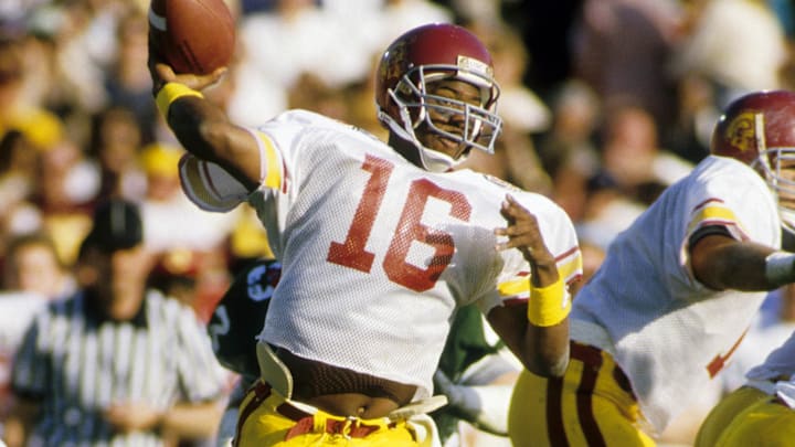 Jan 1, 1988; Pasadena, CA, USA: FILE PHOTO; Southern California Trojans quarterback Rodney Peete (16) in action against the Michigan State Spartans during the 1988 Rose Bowl where MSU beat USC 22-14. Mandatory Credit: Long Photography-USA TODAY Sports