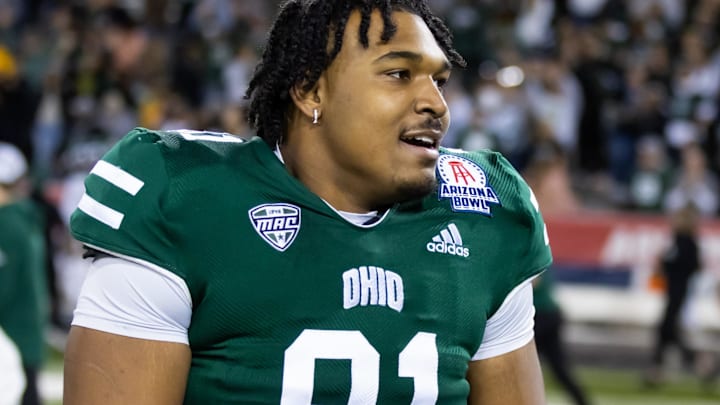 Dec 30, 2022; Tucson, AZ, USA; Ohio Bobcats defensive tackle Bralen Henderson (81) against the Wyoming Cowboys during the 2022 Barstool Sports Arizona Bowl at Arizona Stadium. Mandatory Credit: Mark J. Rebilas-Imagn Images