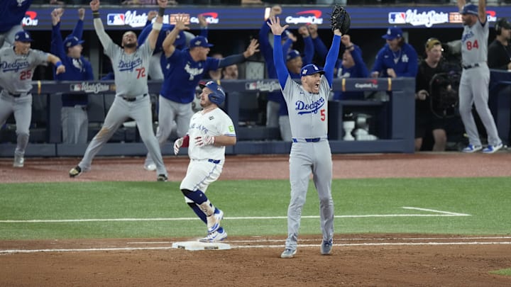 Nov 1, 2025; Toronto, Ontario, CAN; Los Angeles Dodgers first baseman Freddie Freeman (5) celebrates after defeating the Toronto Blue Jays in game seven of the 2025 MLB World Series at Rogers Centre. Mandatory Credit: Kevin Sousa-Imagn Images Nov 1, 2025; Toronto, Ontario, CAN; Los Angeles Dodgers first baseman Freddie Freeman (5) celebrates after defeating the Toronto Blue Jays in game seven of the 2025 MLB World Series at Rogers Centre. Mandatory Credit: Kevin Sousa-Imagn Images