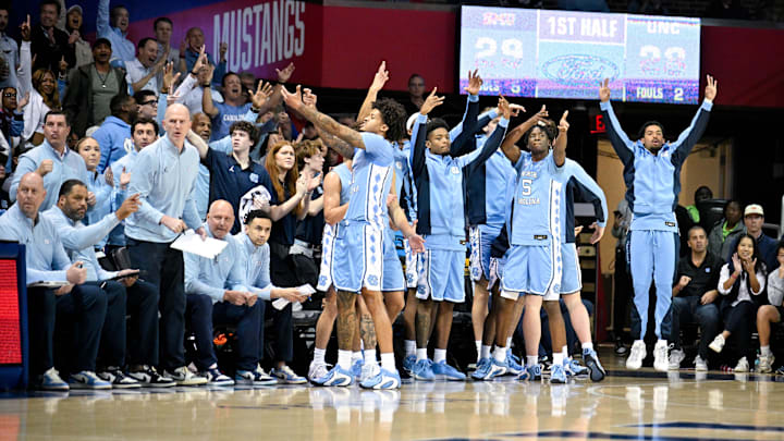 Jan 3, 2026; Dallas, Texas, USA; The North Carolina Tar Heels bench celebrates during the first half against the SMU Mustangs at Moody Coliseum. Mandatory Credit: Jerome Miron-Imagn Images Jan 3, 2026; Dallas, Texas, USA; The North Carolina Tar Heels bench celebrates during the first half against the SMU Mustangs at Moody Coliseum. Mandatory Credit: Jerome Miron-Imagn Images