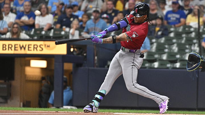 Sep 20, 2024; Milwaukee, Wisconsin, USA; Arizona Diamondbacks second base Ketel Marte (4) hits a home run against the Milwaukee Brewers in the first inning at American Family Field. Mandatory Credit: Michael McLoone-Imagn Images