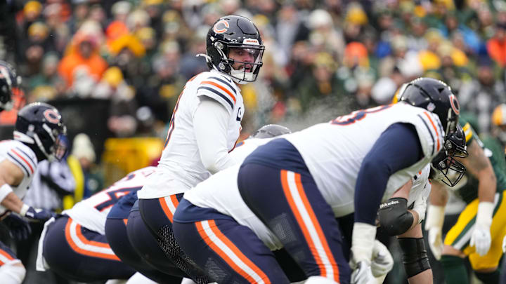 Jan 5, 2025; Green Bay, Wisconsin, USA;  Chicago Bears quarterback Caleb Williams (18) during the game against the Chicago Bears at Lambeau Field. Mandatory Credit: Jeff Hanisch-Imagn Images