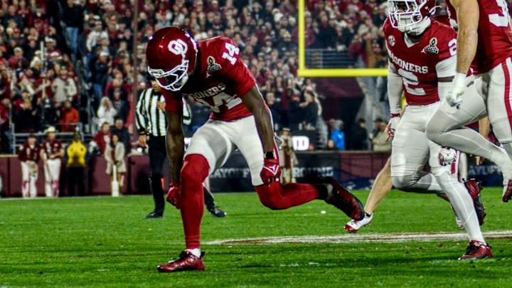 Oklahoma wide receiver Elijah Thomas celebrates after making a tackle against Alabama in the CFP.