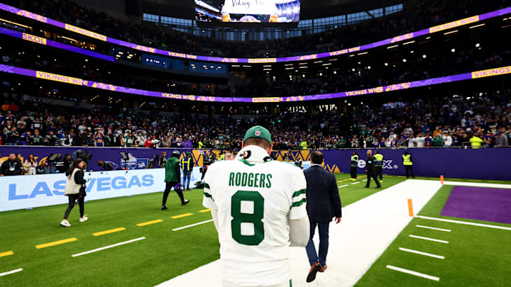 Oct 6, 2024; Tottenham, ENG; New York Jets Quarterback Aaron Rodgers (8) walks to the locker room after the 17-23 defeat against Minnesota Vikings at Tottenham Hotspur Stadium. 