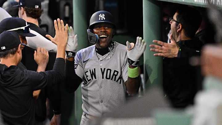 Sep 13, 2025; Boston, Massachusetts, USA; New York Yankees second baseman Jazz Chisholm Jr. (13) celebrates his one run home run in the dugout during fifth inning inning against the Boston Red Sox at Fenway Park. Mandatory Credit: Eric Canha-Imagn Images
