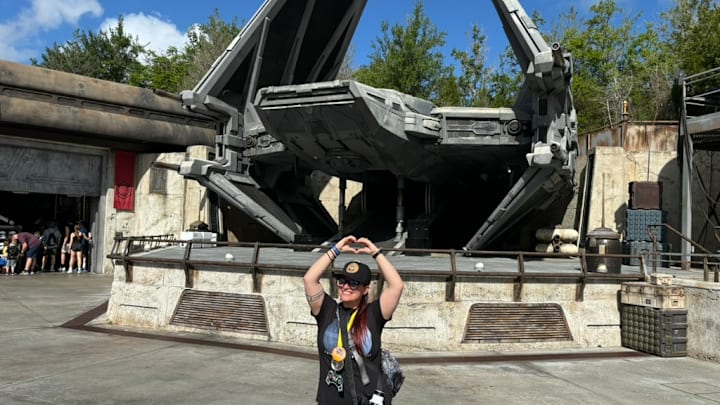 Staff writer Camila Domingues makes her love for the First Order known in front of the First Order TIE echelon at Galaxy's Edge, Disney's Hollywood Studios.
