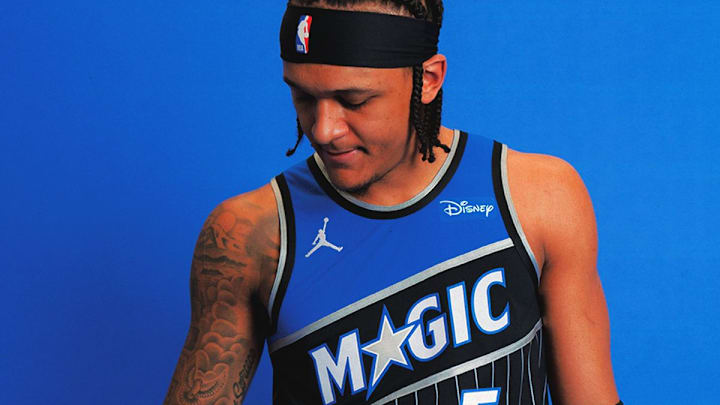 The Orlando Magic unveiled a new look and a new logo, calling back on the team's past and satisfying fans' desires to return to the team's original look.