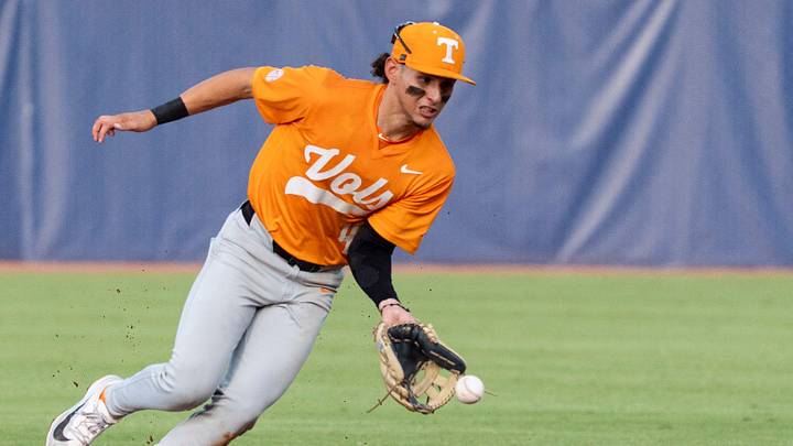 Tennessee Volunteers' Manny Marin (4) scoops a ground ball as Arkansas Razorbacks take on Tennessee Volunteers during the SEC baseball tournament at Hoover Metropolitan Stadium in Hoover, Ala. on Wednesday, May 20, 2026. Arkansas Razorbacks defeated Tennessee Volunteers 8-4.