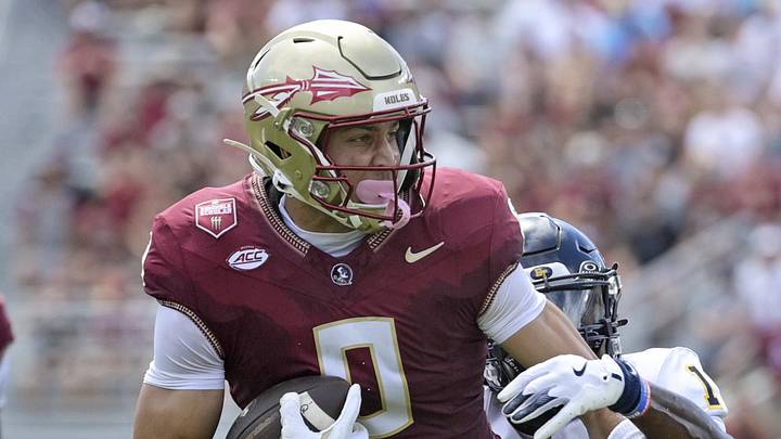 Sep 6, 2025; Tallahassee, Florida, USA; Florida State Seminoles wide receiver Duce Robinson (0) catches a pass over East Texas A&M Lions cornerback Kaleb Miles (1) during the first half at Doak S. Campbell Stadium. Mandatory Credit: Melina Myers-Imagn Images Sep 6, 2025; Tallahassee, Florida, USA; Florida State Seminoles wide receiver Duce Robinson (0) catches a pass over East Texas A&M Lions cornerback Kaleb Miles (1) during the first half at Doak S. Campbell Stadium. Mandatory Credit: Melina Myers-Imagn Images